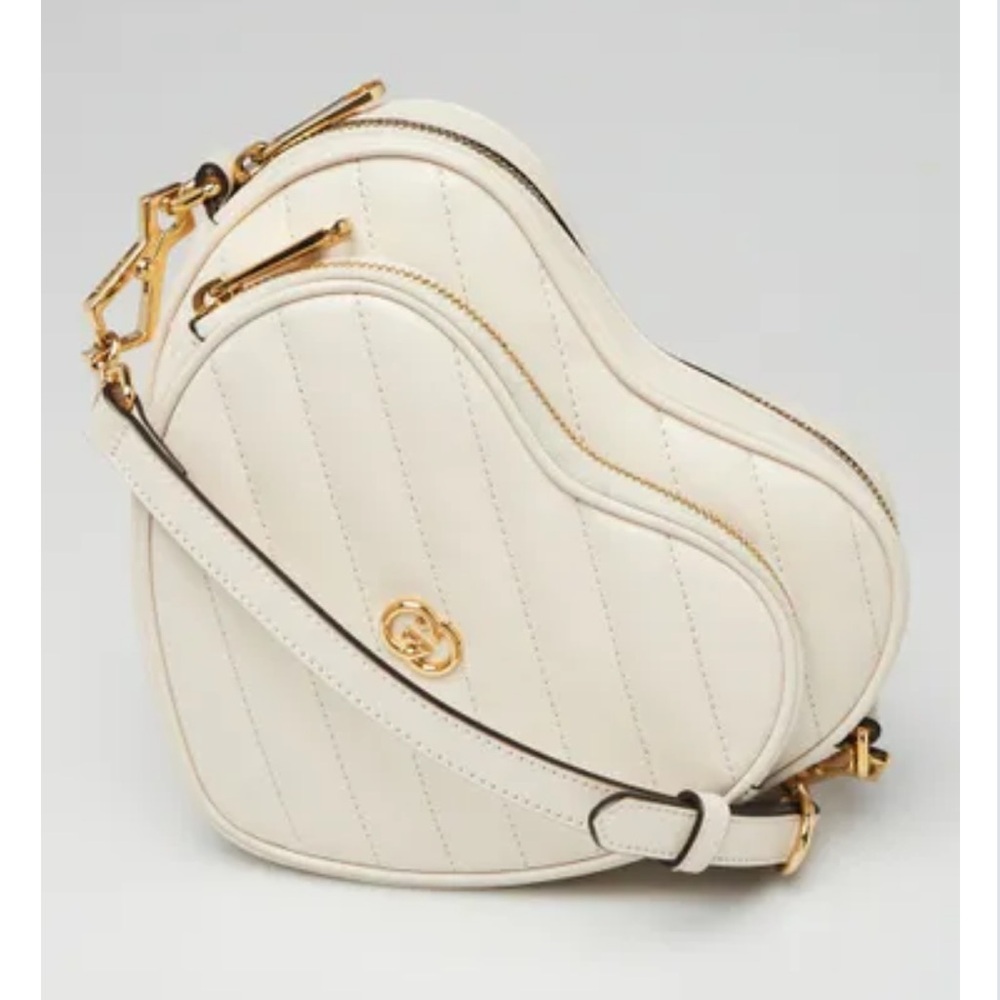 New! GUCCI
White Quilted Leather
Interlocking G Mini Heart
Crossbody Bag - Picture 8 of 12